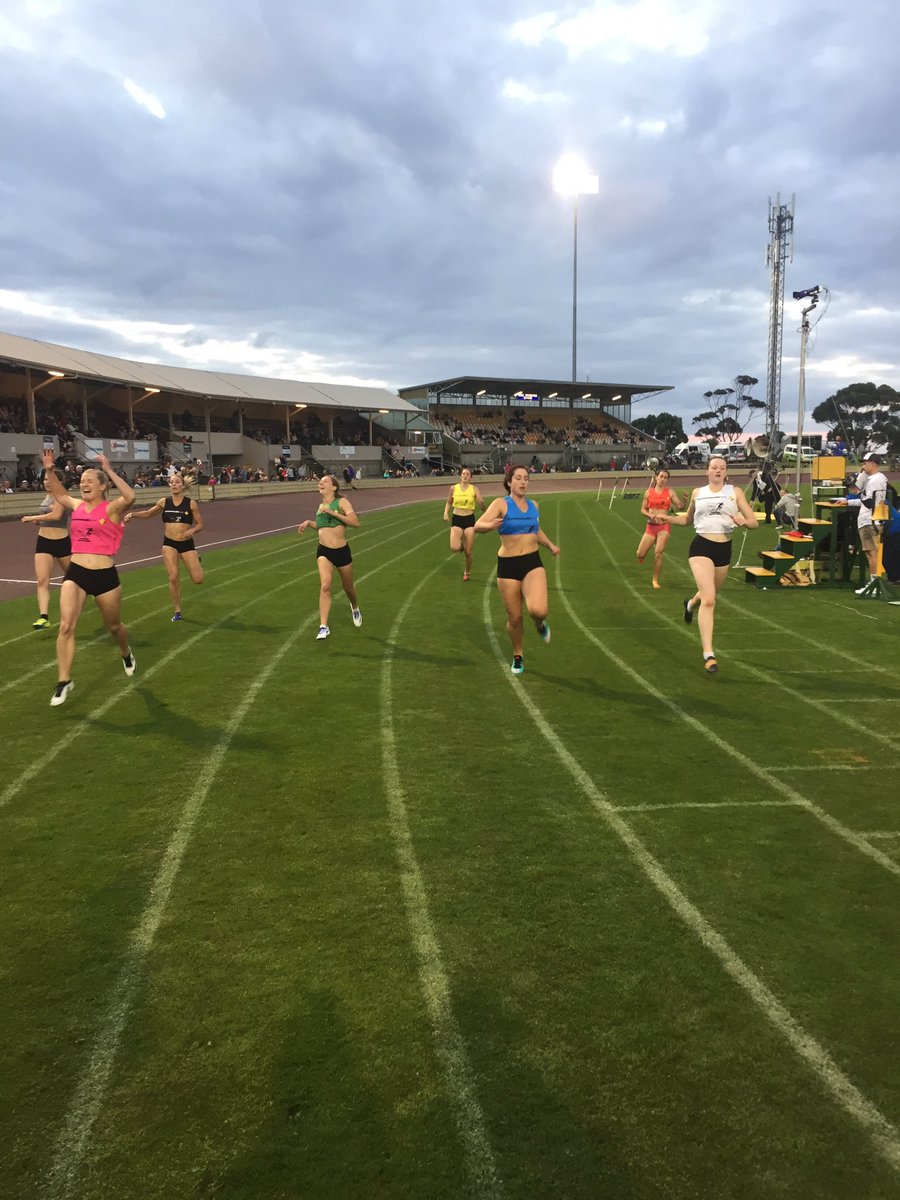 Laura Downie (in the pink) wins the 200m at Devonport #SCAT17