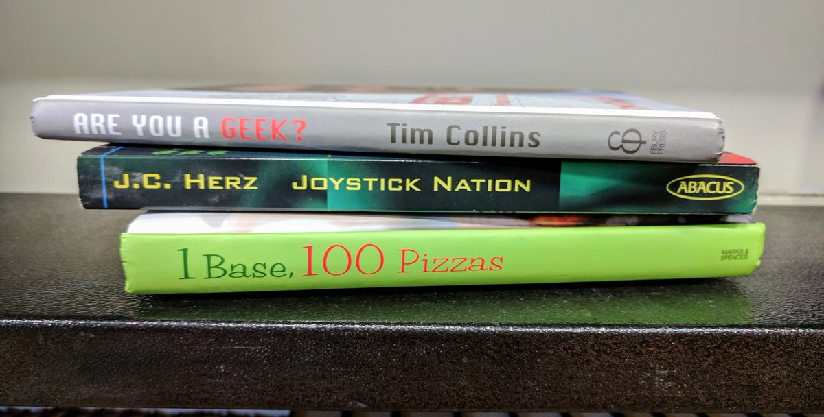 OxBksMuswell's tweet photo. Found these on a shelf together in the Sci-fi/Fantasy section. Wonder why? #NotJudging  #LoveGeeks #LovePizza https://t.co/FBBH8tMbYt