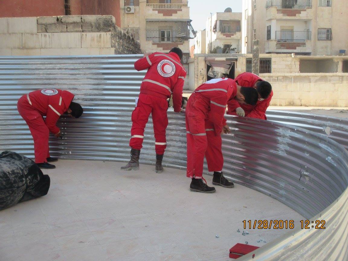 BritishRedCross's tweet photo. Last month, our colleagues in Aleppo installed water tanks. Now,  thousands of people have access to water again. https://t.co/WlbF3HIlLF