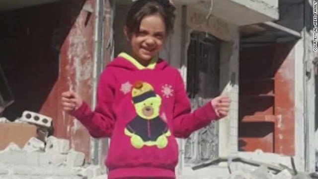 cnnbrk's tweet photo. 7-year-old girl who gained notice by tweeting from Aleppo has been evacuated with her family, medical charity says. https://t.co/4cRTAAqgmN https://t.co/Fyrkrj2th5