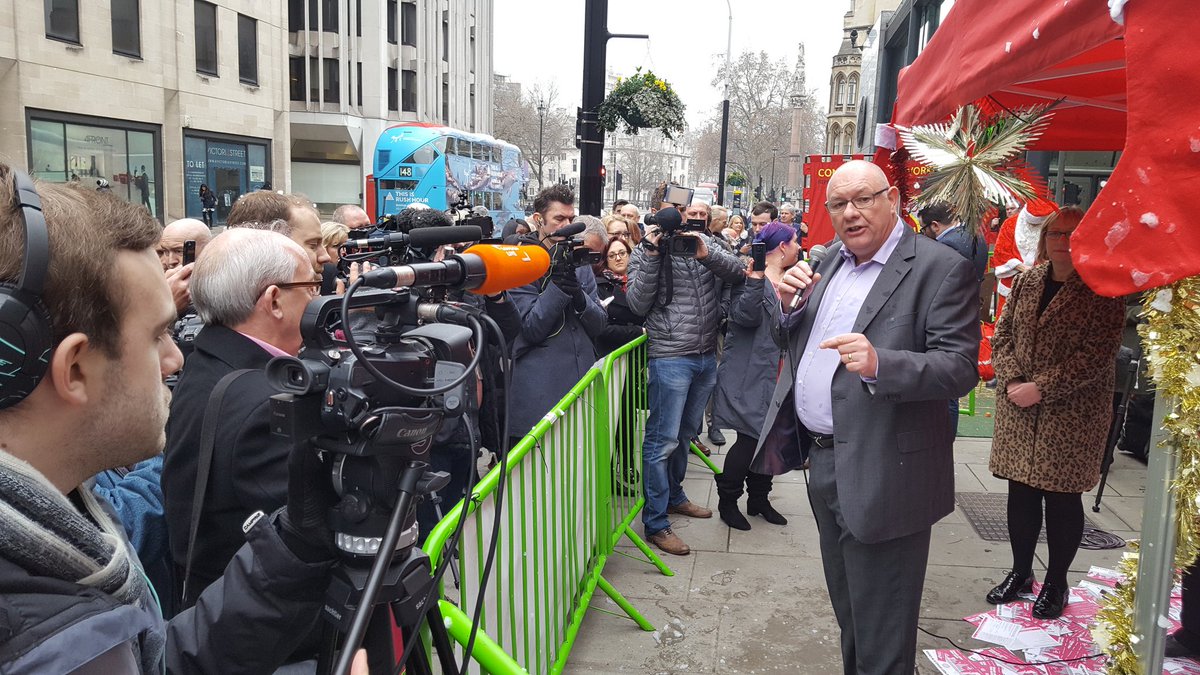 resistunite's tweet image. @CWUnews brings a crowd outside BIS amidst national #CrownPost strike and Santa and Rupolph support the strike too! #Solidarity @DaveWardGS