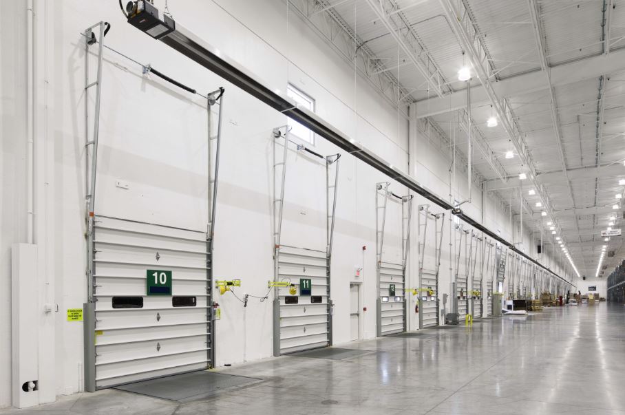 "Vertical lift” is defined as  the track  which allows a sectional door to open vertically along the wall above the door opening. #Garage101