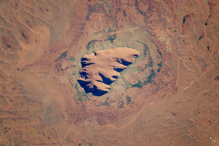 NASAEarth's tweet photo. Uluru https://t.co/xm2g2eLadq #NASA https://t.co/motY5A7CPj
