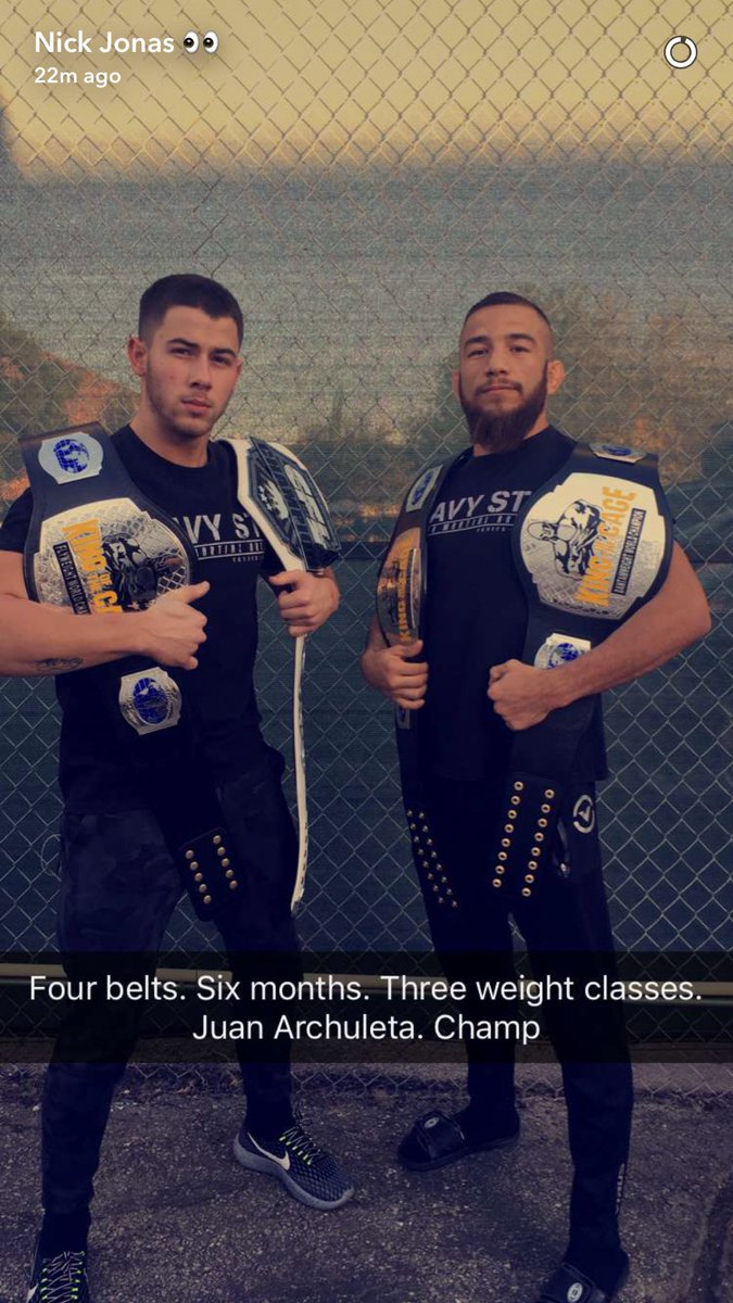 LauraTrent11's tweet photo. A win deemed impossible, achieved. @nickjonas just posted this homage "Four belts. Six months. Three weight classes. Juan Archuleta. Champ." https://t.co/vs4Ti7uY89