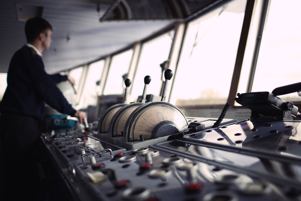 A Captain at the helm of his ship.