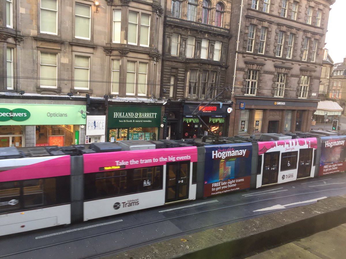 nevermoreagency's tweet photo. Look what just glided past our office! #wemadethis @EdinburghTrams #tramwrap https://t.co/S04Zg8fAYV