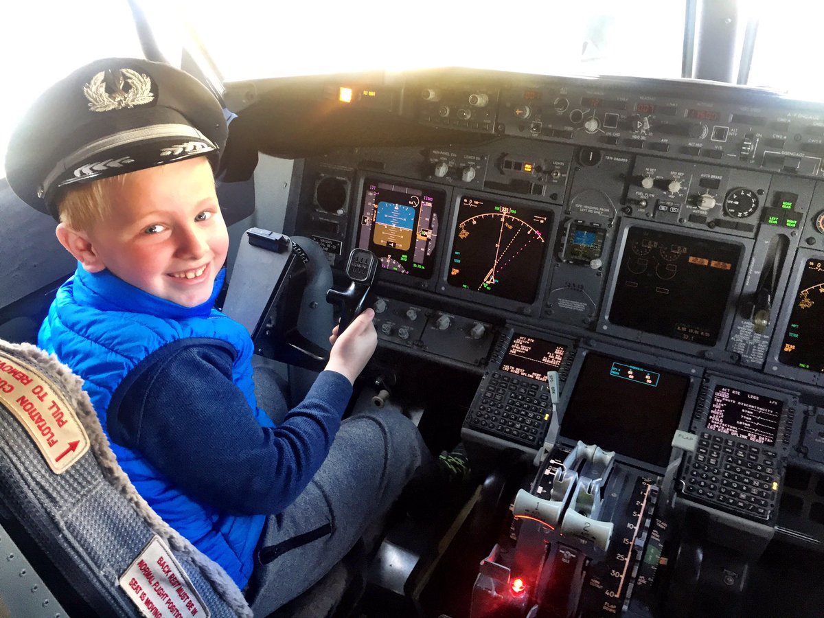 caaptainbrad's tweet photo. Watching the birth of a new #AvGeek is one of my favorite parts of the job. Say hello to my new friend, Ryan. @AmericanAir https://t.co/ZLBXoOz42Q