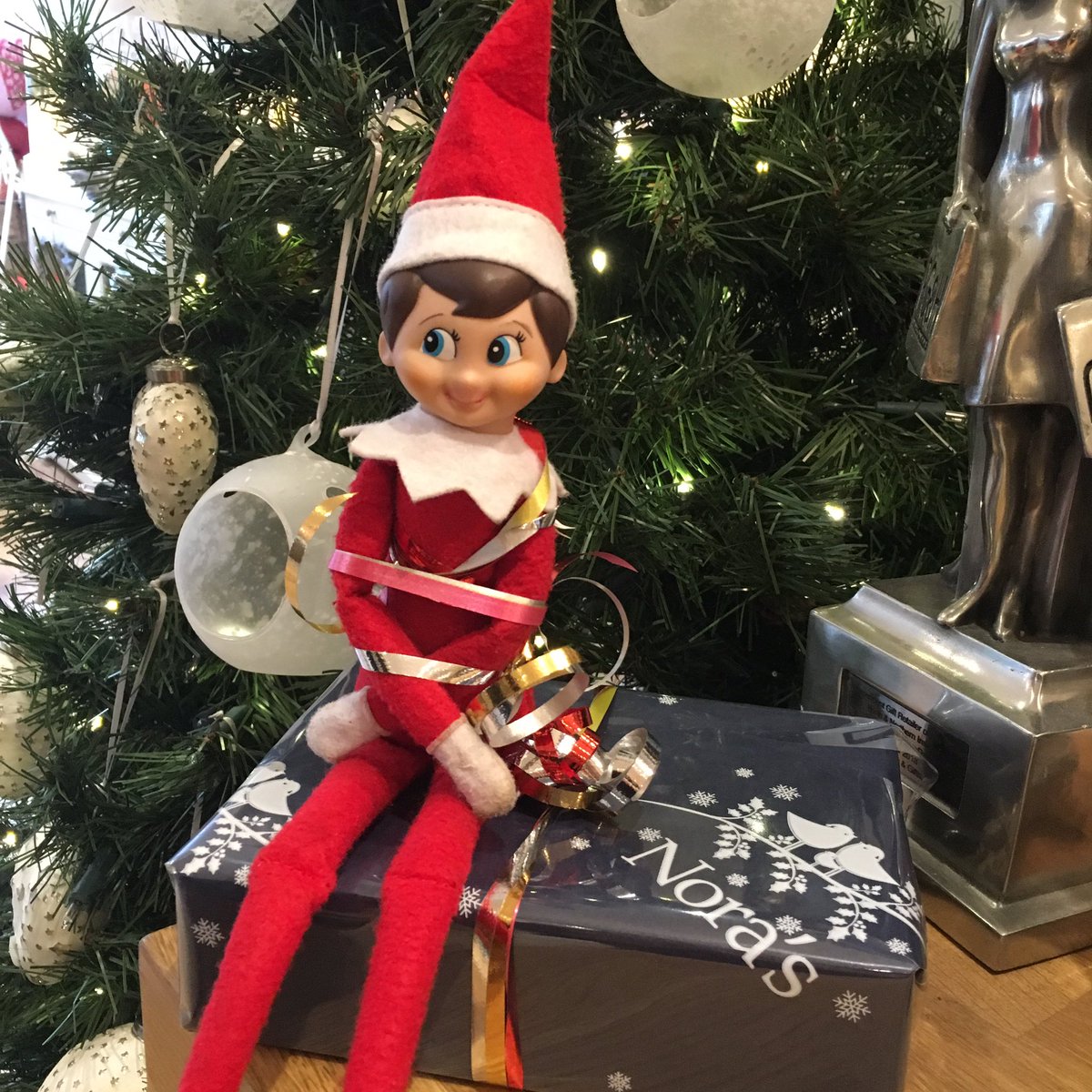 We've got a helper this afternoon! Think he might need a bit more gift wrapping training though 🎁 <a href="/shoosocial/">SHOO | Marketing consultancy</a> #elfonashelf #ilkley