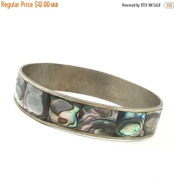 theoldvintageco's tweet photo. 25% OFF - Mexican Alpaca Silver Bracelet, Abolone Shell. Hallmark Mexic… https://t.co/9b4PqesZTU #Etsy #AboloneShell https://t.co/D6HLTWuOZG