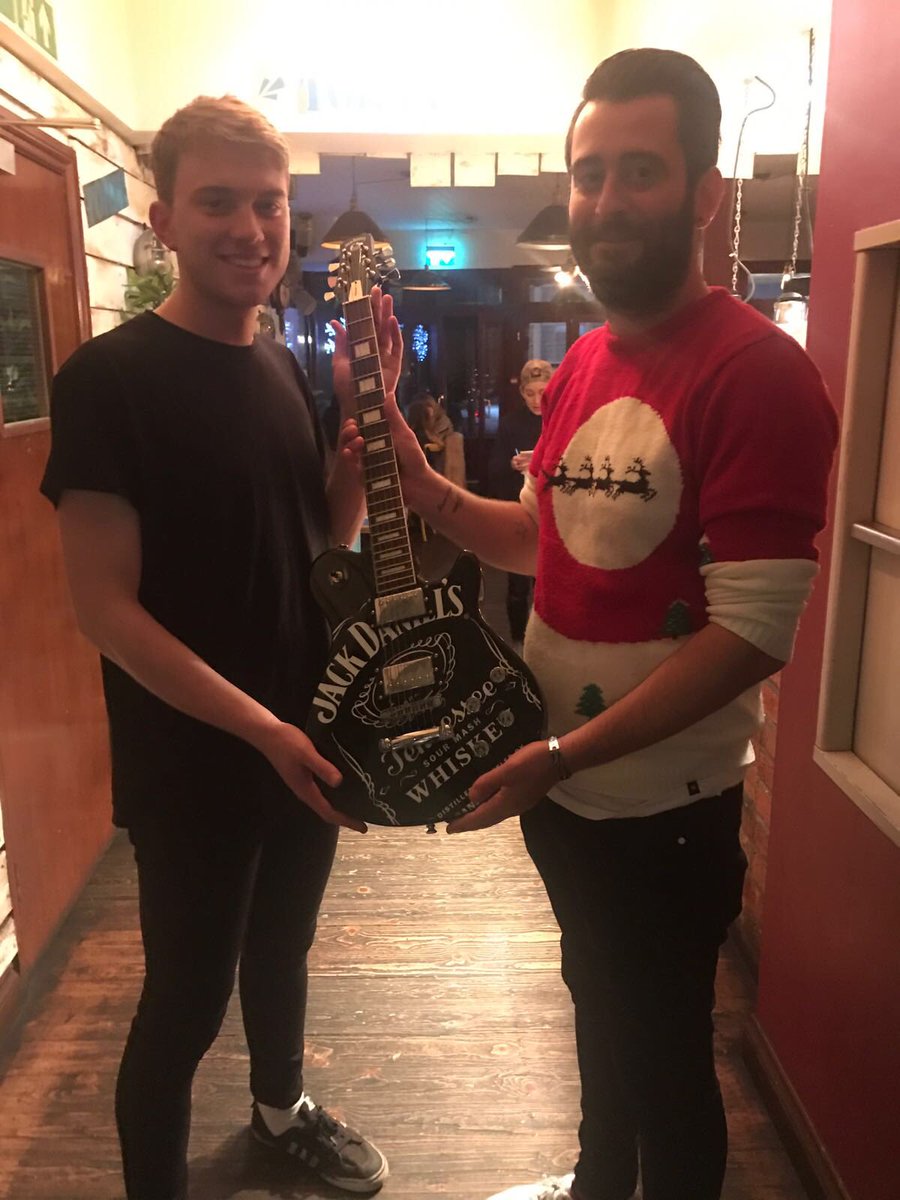 The amazing Josh [left] receiving his Staff Performance award - a <a href="/JackDanielsUK/">jackdanielsuk</a> guitar!! Well done Josh 👏🏼👏🏼