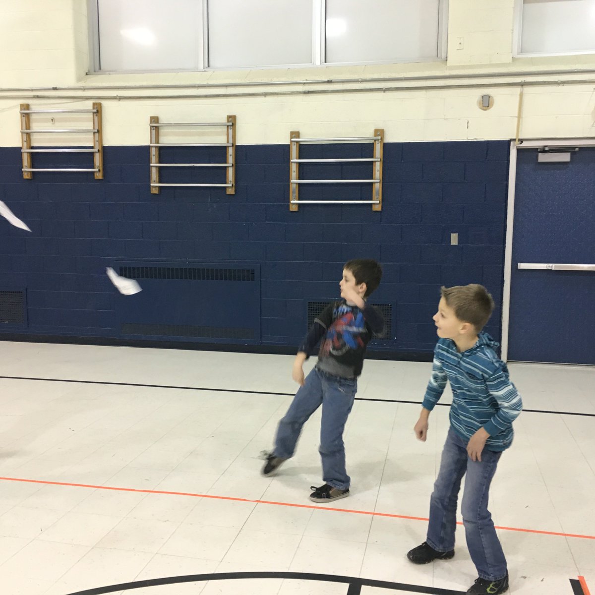 Students creating paper airplanes and using overhand throw to make the fly. <a href="/EdmonsonLions/">Edmonson Elementary | The Lamphere Schools</a> #wearelamphere