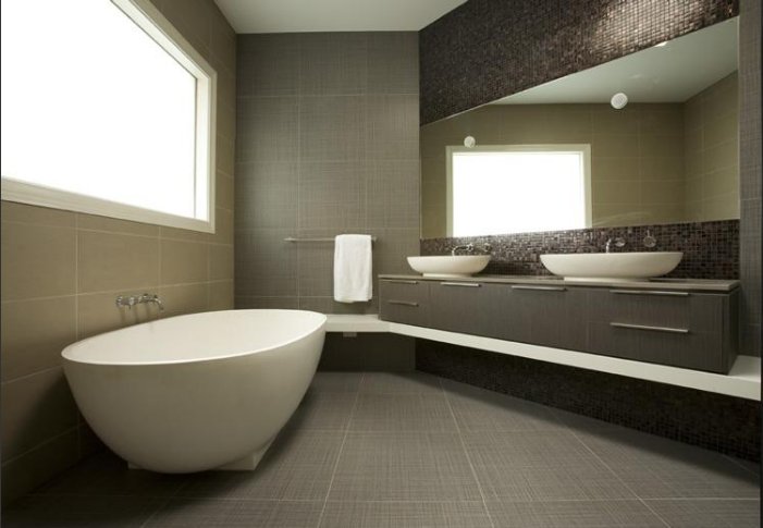 Want your bathroom to be less bright? Check out this sleek dark design for some inspiration. homeimprovementpages.com.au/photo/bathroom…