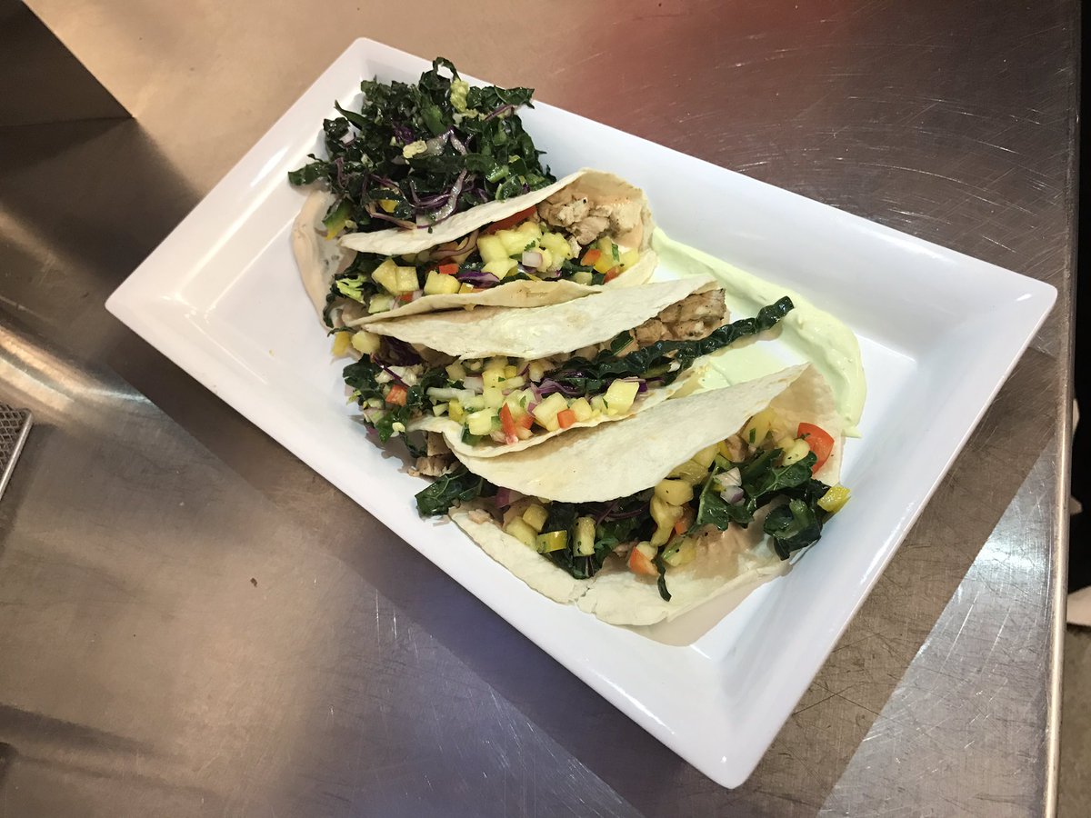 Secret pop up station every Wednesday.  Today's secret revealed Jerk Chicken tacos with Poblano Slaw and Pineapple Salsa 🍍