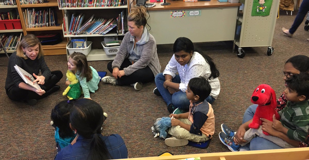 Amy Sanchez models a read aloud for a Family Resource Center playgroup and gave parents tips on supporting their children's love of reading.
