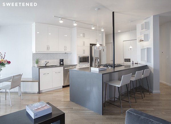 Matte gray countertops from <a href="/CaesarstoneUSA/">Caesarstone USA</a> contrast beautifully with bright white <a href="/IKEAUSA/">IKEA USA</a> cabinets. #realreno bit.ly/1MRmGva