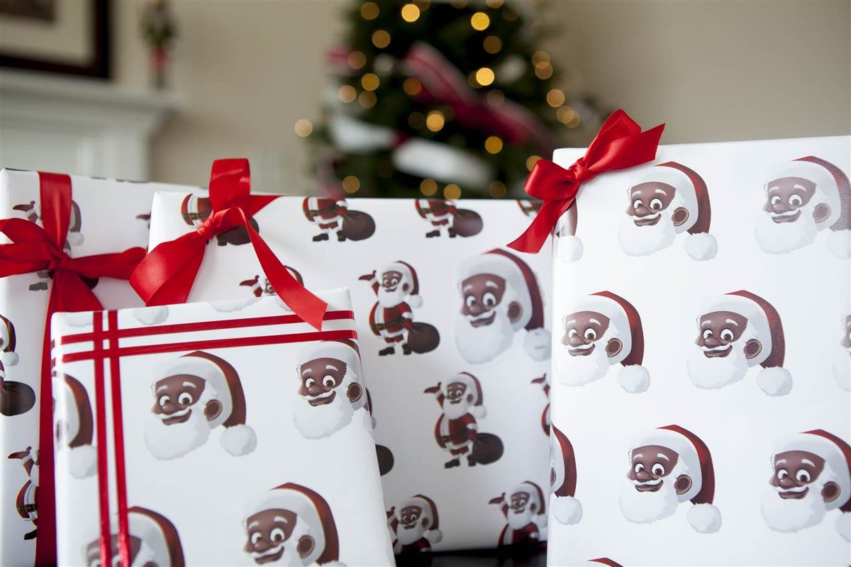 Blavity's tweet photo. This black-owned company created holiday wrapping paper that features Black Santa https://t.co/otaZqxExC8 https://t.co/4IZUpUXQ8v