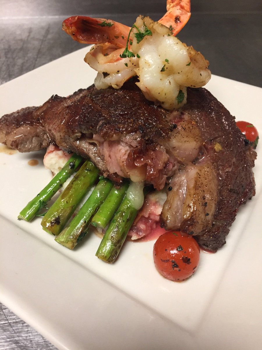 Dinner special tonight!!! 12oz ribeye stuffed with brie and prosciutto, mash potato, steak tomato, grilled asparagus and jumbo shrimp!!