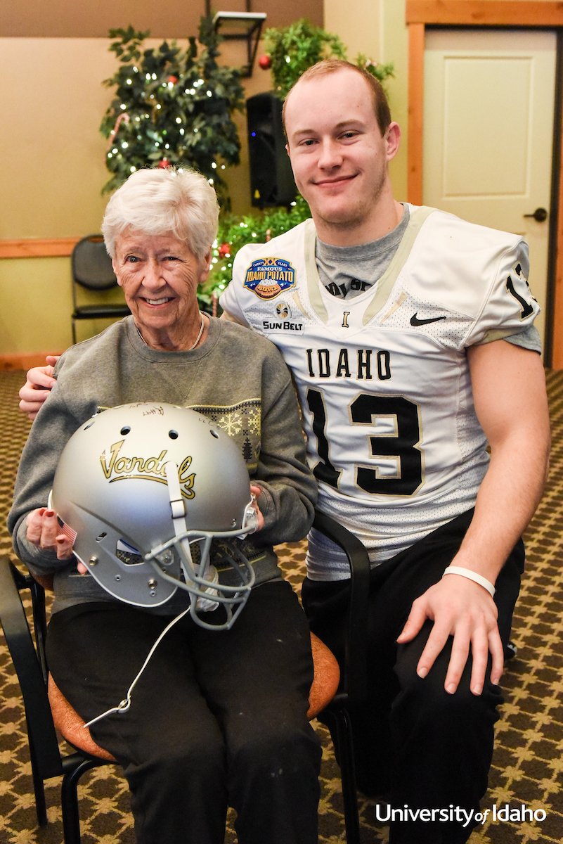 uidaho's tweet photo. The @VandalFootball team  surprised Peg McGee, senior Trent Cowan’s grandmother, this a.m. during a Vandal Spirit Day @ Meridian. #GoVandals https://t.co/HHD7VqpX7O