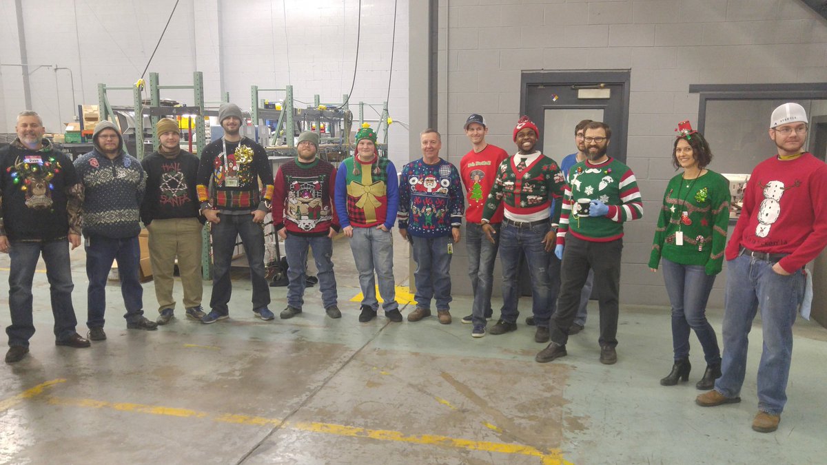 SyneticTech's tweet photo. Synetic employees participating in an Ugly Christmas Sweater Contest as operations wind down for the #HappyHolidays https://t.co/rDWmXIrTke