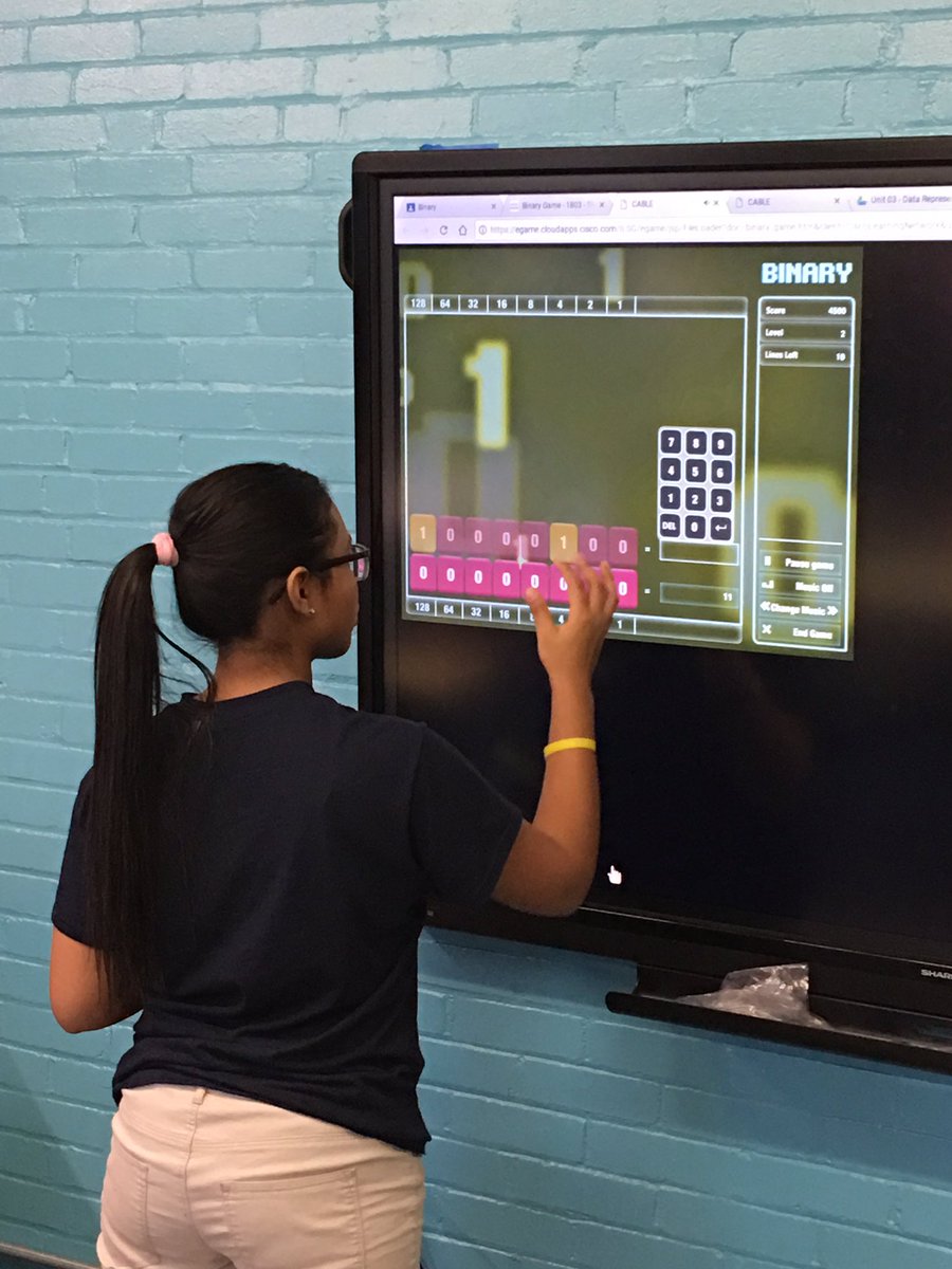 MrDornback's tweet photo. Freshman @ACE_Providence reinforcing their #binary knowledge on a Sharp #touchscreenTV with the @Cisco Binary Game https://t.co/8TQWyBl6lx