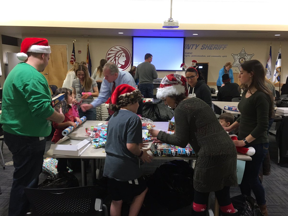 ArapahoeSO's tweet photo. This is what wrapping 900 presents looks like! Thanks to our volunteers for helping us get them ready for families around Arapahoe County! https://t.co/fXEhgxyUDw