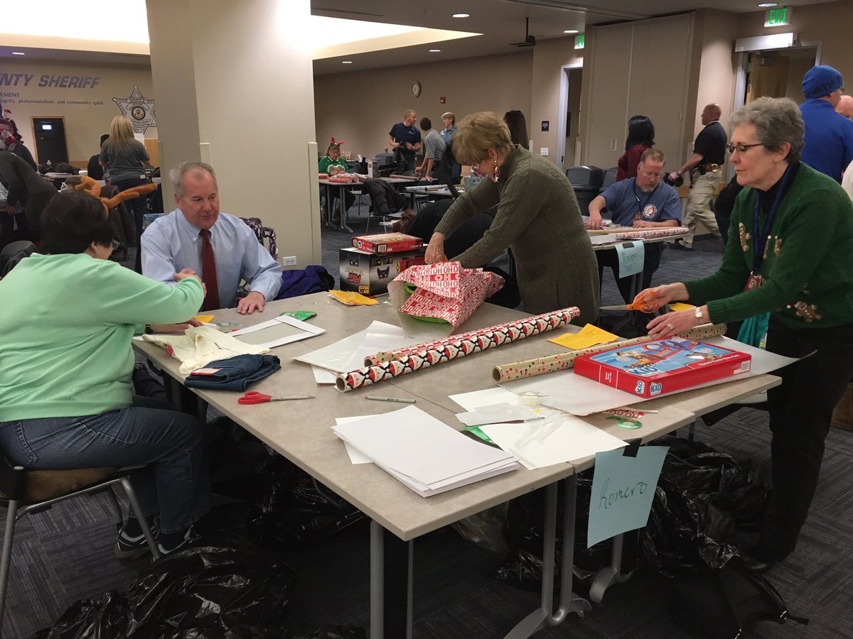 ArapahoeSO's tweet photo. This is what wrapping 900 presents looks like! Thanks to our volunteers for helping us get them ready for families around Arapahoe County! https://t.co/fXEhgxyUDw