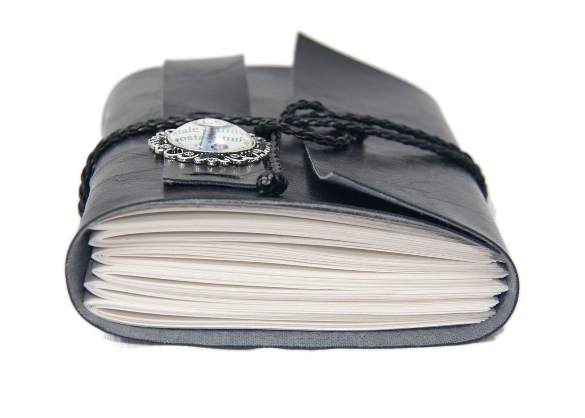 BoundByHandUS's tweet photo. Black Faux Leather Journal - Travel Journal - Cameo - Art Journal -… https://t.co/Auy2Vlvxoj #MyNewTag #WrapJournal https://t.co/OHUo40X5in