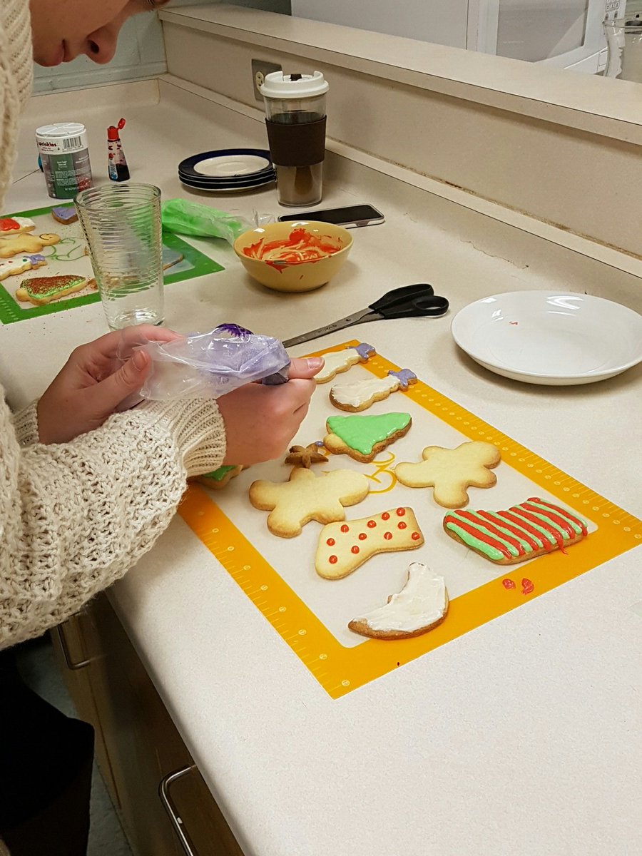 Ms_Manary's tweet photo. Grade 12s decorating their holiday cookies! #tweetthehalls @SCDSB_Schools @VPWilkinson @MikeAbram6 https://t.co/UHAWooVCke