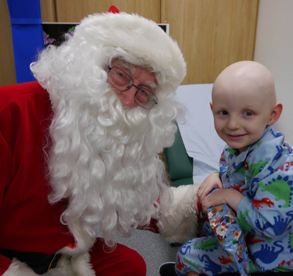 CCCNHS's tweet photo. Santa surprises young patient at The Clatterbridge Cancer Centre. Happy Christmas Eve Eve Eve! https://t.co/6X5v26RGZo https://t.co/IgaCOBpZ2z