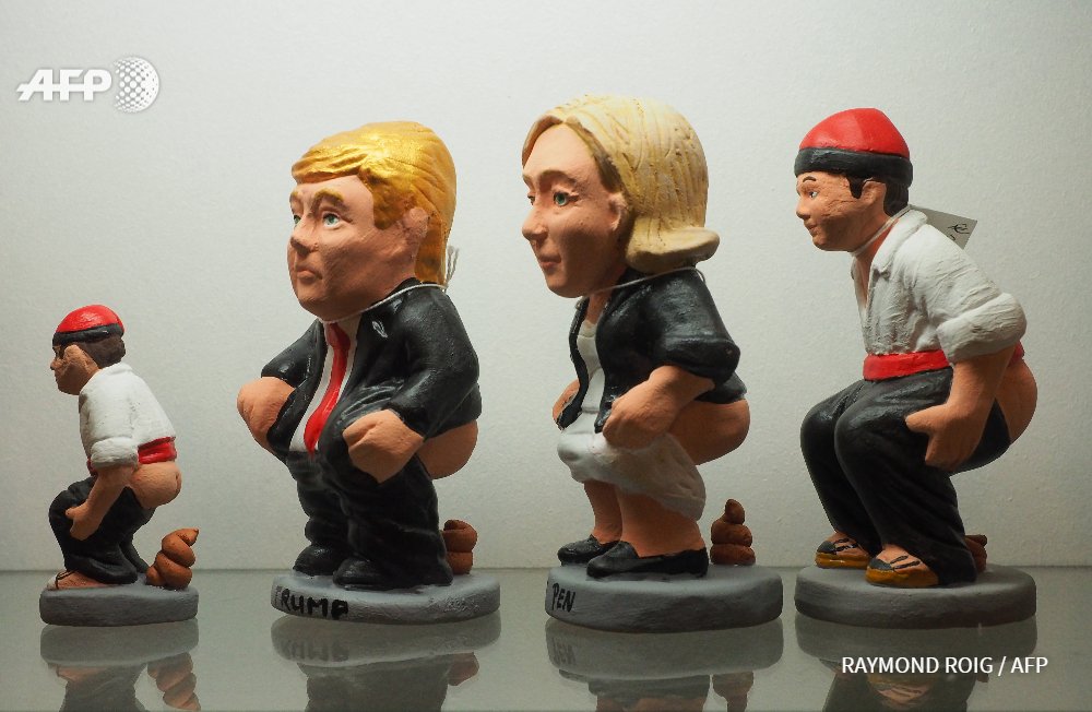 Marine Le Pen et Donald Trump, nouveaux santons "chieurs" de Noël u.afp.com/45o8 #AFP