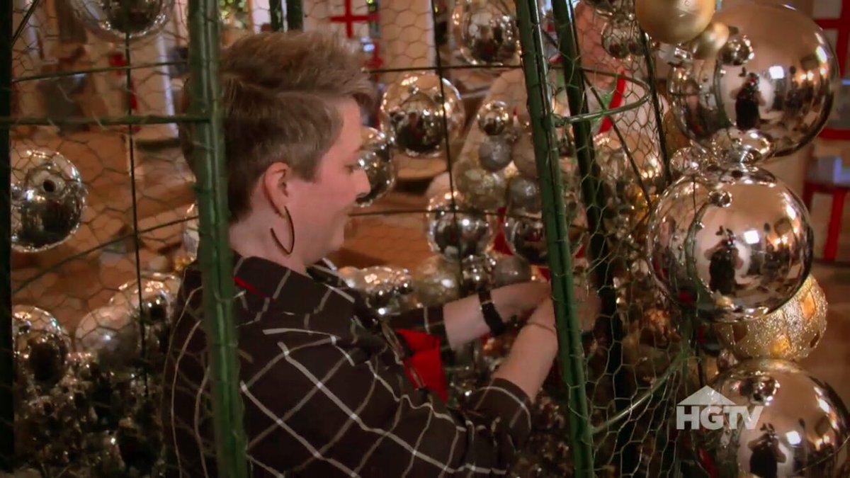 Trevscape's tweet photo. Great action shot of Christina from the @hgtv White House Holiday Special. She wired over a 1k ornaments to this 8ft wire tree. https://t.co/aSWfDERj8K