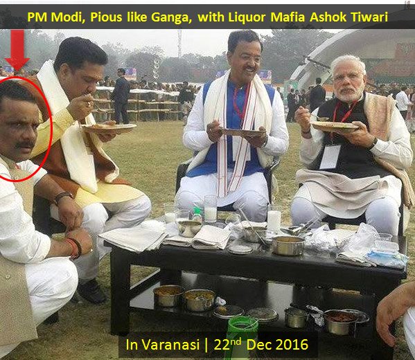 GauravPandhi's tweet photo. PM Modi was supposed to have lunch w booth level workers in Varanasi yesterday. Instead was seen with Liquor Mafia Ashok Tiwari. Lol pious! https://t.co/aWgQ4B283N