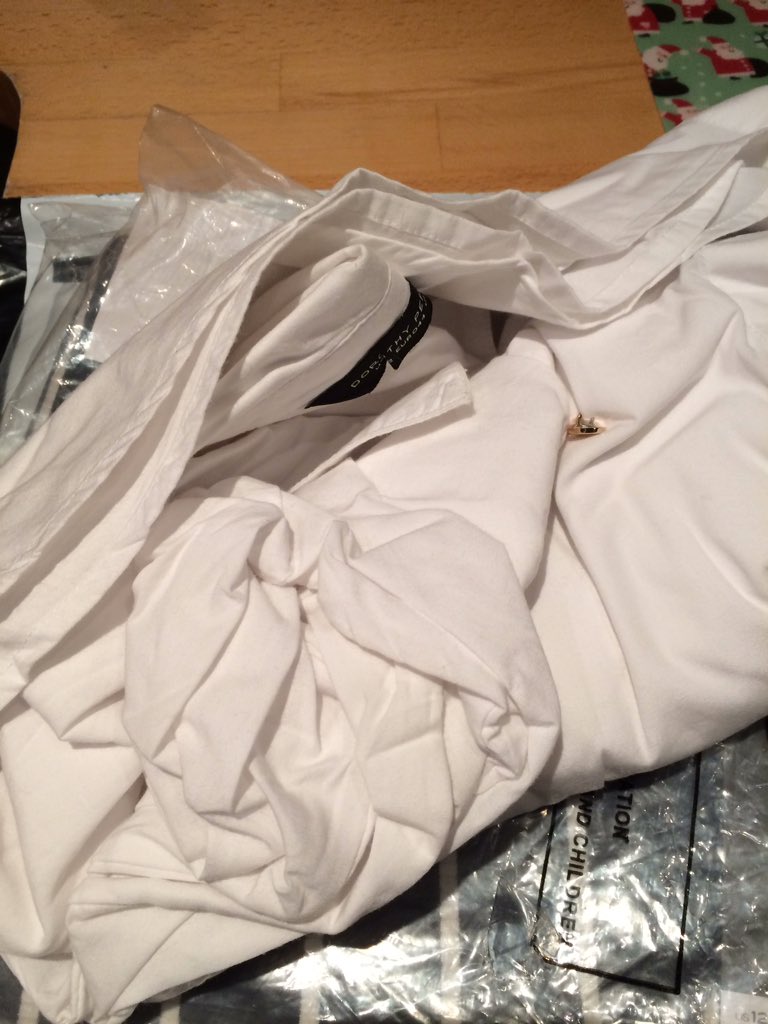 MrsFlyingBlind's tweet photo. Just received a shirt from @Dorothy_Perkins button broken off and screwed up in the bag #disappointed #whatnottowear https://t.co/rHqJXrSWfU
