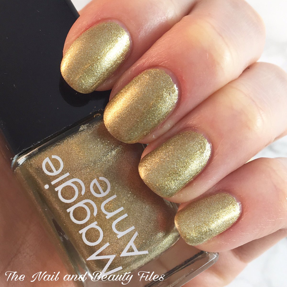 TheNail&BeautyFiles (@tnbf_blog) on Twitter photo This is the gorgeous Carmela by <a href="/MaggieAnneNail/">MaggieAnneNailPolish</a> Such a pretty shimmery Gold ❤️ #nails #nailblogger #bblogger This is the gorgeous Carmela by <a href="/MaggieAnneNail/">MaggieAnneNailPolish</a> Such a pretty shimmery Gold ❤️ #nails #nailblogger #bblogger