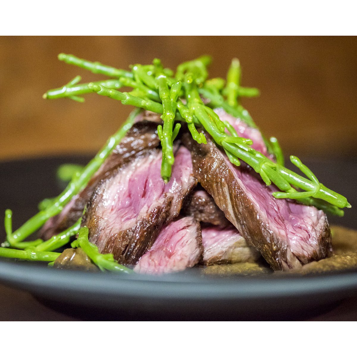 tbl11's tweet photo. Our seared bavette steak served pink, with mushroom &amp; anchovy ketchup is sure to go down well with the carnivores at the table! @DMNGlasgow https://t.co/hccXdVV2v1