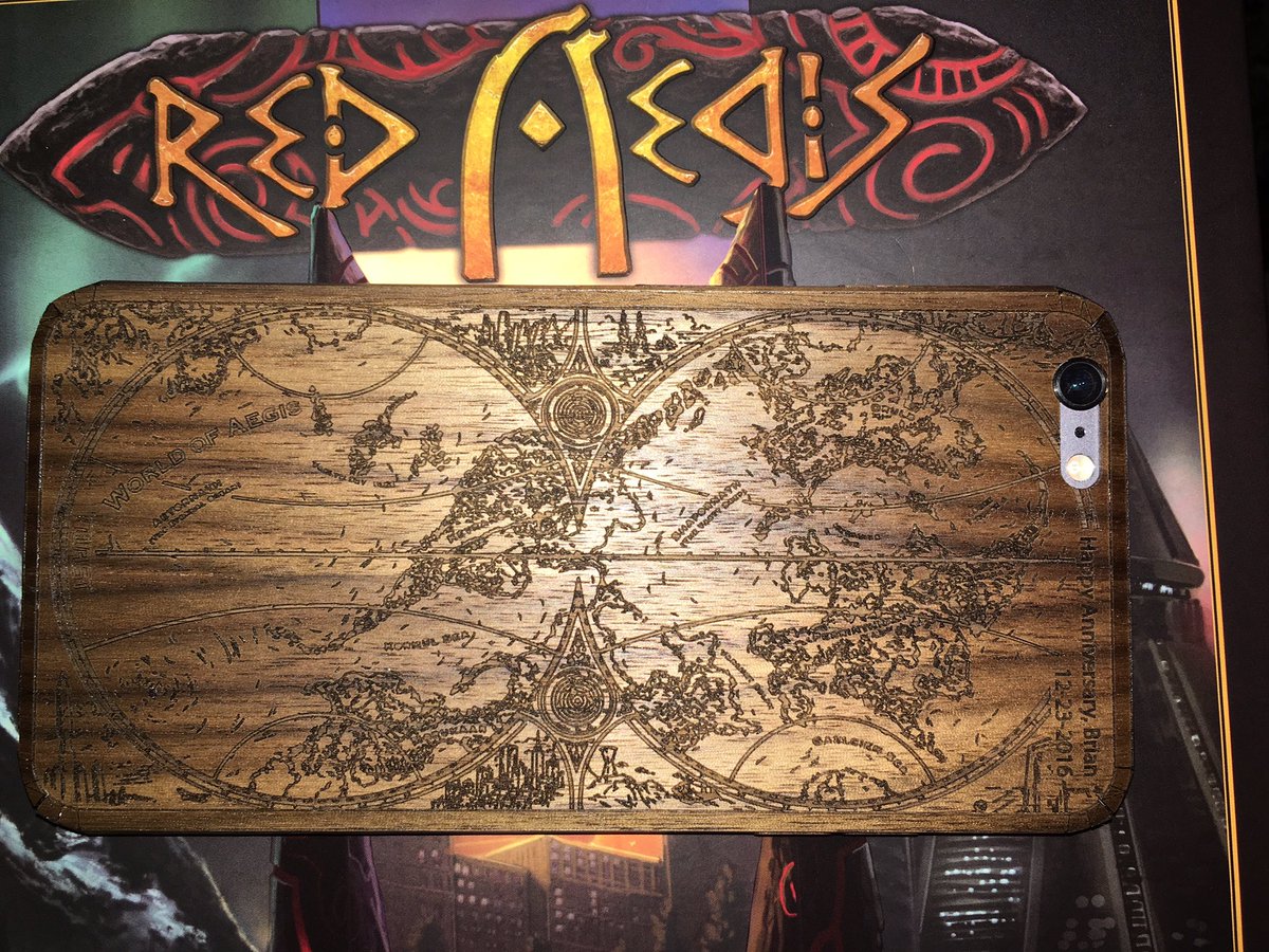 brianrjames's tweet photo. My wife colluded with @schley to create a sweet wedding anniversary gift: a RED AEGIS wood engraved case for my iPhone! https://t.co/zmzHpBD8w2