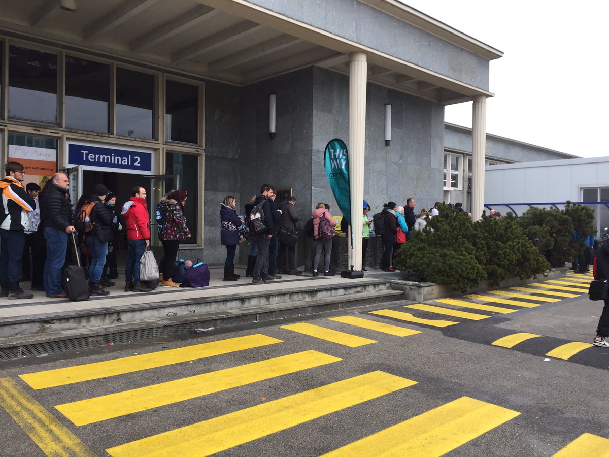 Jen_Smith88's tweet photo. Absolutely disgusting treatment from @GenevaAirport and @Monarch having to queue for security OUTSIDE in freezing temperatures https://t.co/qfVQMD2W8n