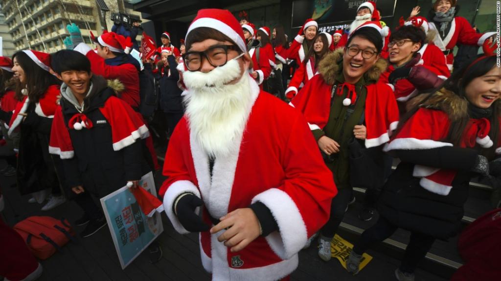CNN's tweet image. Protesters dressed as Santa Claus took to the streets Saturday to march against South Korea's impeached president cnn.it/2hBIgc2