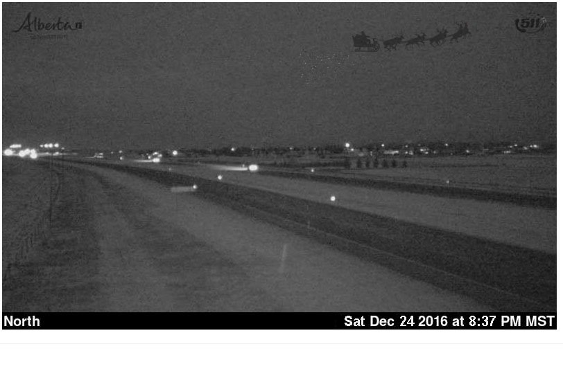 511Alberta's tweet photo. We've spotted Santa making a pass over Hwy2 in Southern Alberta! Happy Holidays from the 511 Alberta Team! #ABRoads https://t.co/7hv6dg2La8
