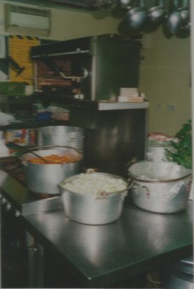 caringinbristol's tweet photo. #CAC87 - getting #Christmas lunch ready for our #homeless guests in 1987! We now serve 4,581 hot meals over 11 days during #CAC16. https://t.co/sG1AXIntJc