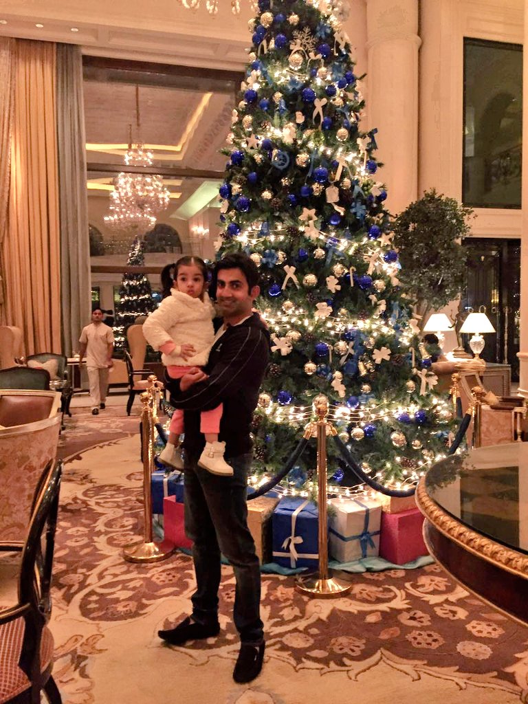 GautamGambhir's tweet photo. Enjoying the Christmas festivities with the apple of my eye - my pouting angel! #MerryChristmasEveryone https://t.co/g9OAjfWKM5
