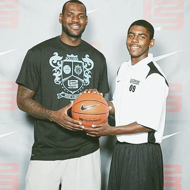 Throwback: LeBron posing with a 17 year-old Kyrie at his basketball camp in '09.