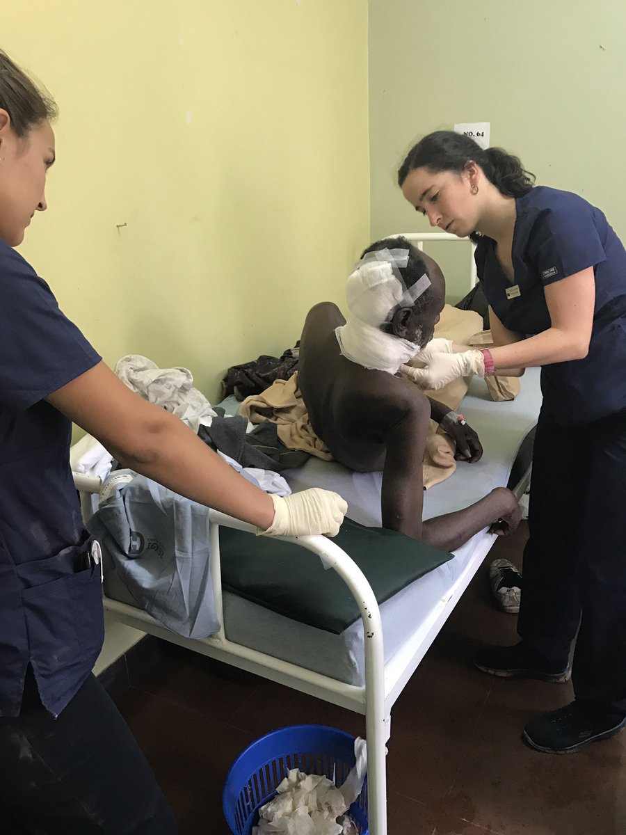 Volunteer from Chile D.r Fer Libano Attends to a cancer patient at the hospital during the Christmas Day.