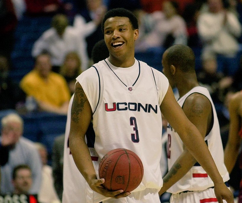 Huskies6X's tweet photo. Husky History: 12/26/00 - UConn freshman Caron Butler tallies a triple-double with 14 points | 12 assists | 11 rebounds vs Rhode Island. https://t.co/GYJNd0C47a