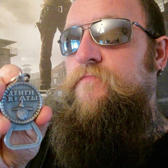 BeardToken's tweet photo. Al Davis with his Beard Token bottle opener. You can get one for yourself at https://t.co/nByH0dtqr3 https://t.co/GdC1dpTZkz