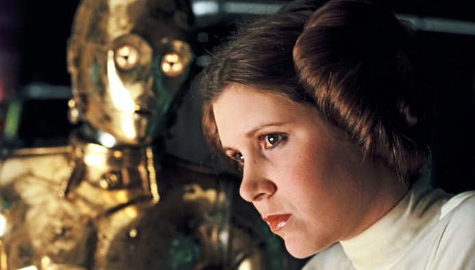 EW's tweet photo. Lucasfilm president Kathleen Kennedy says Carrie Fisher "defined the female hero of our age over a generation ago." https://t.co/Or2LmlnYco https://t.co/yMzAAYkvty