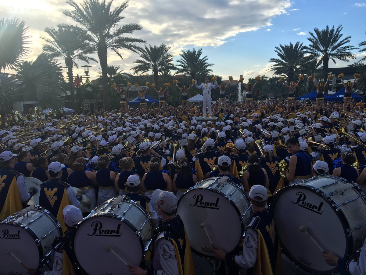 WVUfootball's tweet photo. Packed house of Gold &amp; Blue at today's pep rally here in Orlando! #BeatMiami #HailWV https://t.co/jeI3rmeqHU