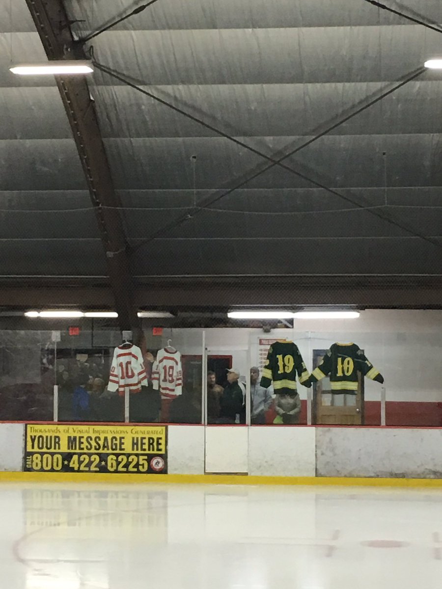 NRHSHockey's tweet photo. Puck drop at 4. Jerseys hung honoring the two Falmouth hockey players, #10 and #19 who tragically lost their lives this past week. https://t.co/o8QRlrStPF