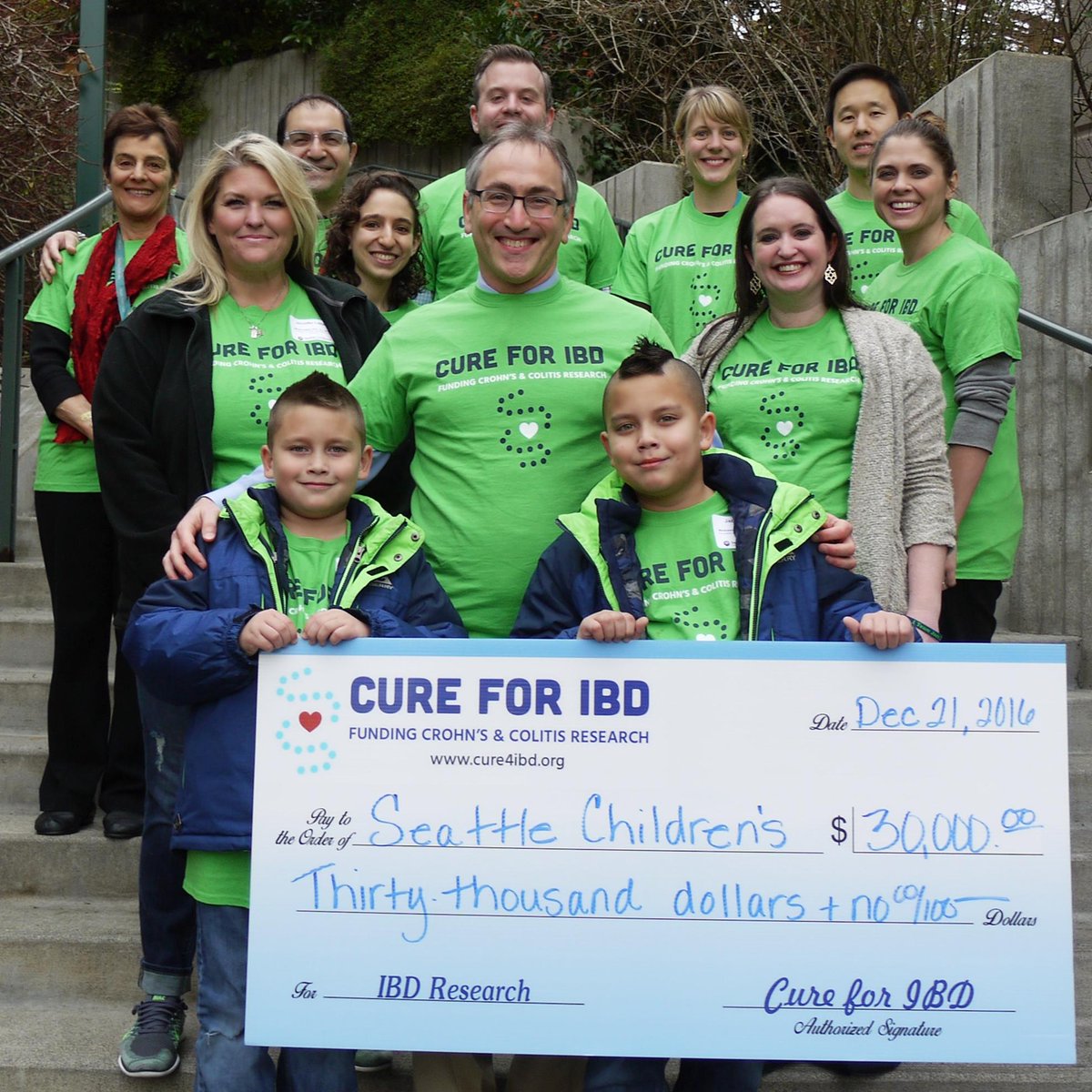 Cure four IBD presented Seattle Children's with a $30,000 check to advance IBD research.