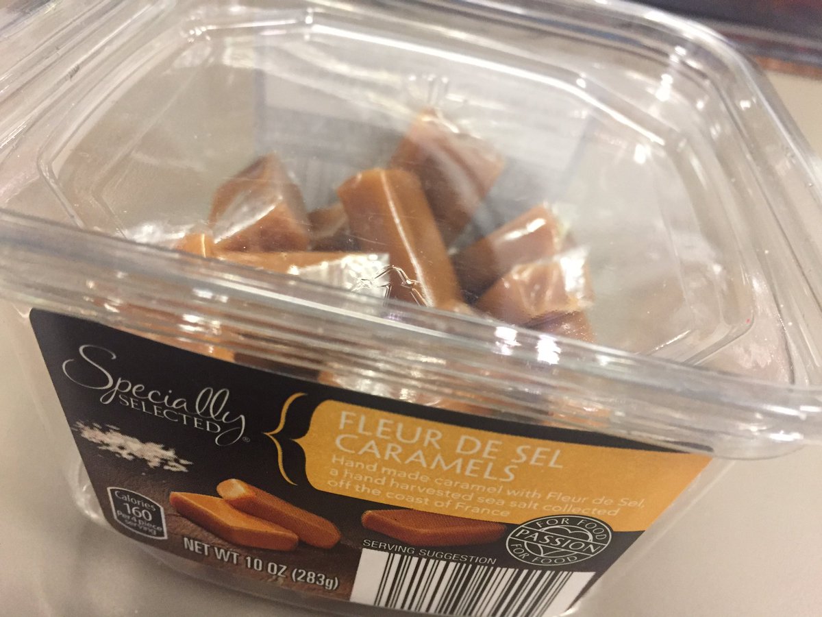 DiaWall's tweet image. When your desk mate @RichardKSHB obviously loves or is trying to sabotage you. Salted caramels make me weak! 😋😩 #ResolutionFail #DidntEatAny